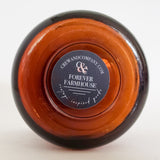 Bottom view of the amber glass soy candle vessel. Forever Farmhouse Fragrance. 