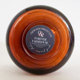 Bottom view of the amber glass soy candle vessel. Forever Farmhouse Fragrance.