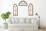 Living room with two medium arches and one half moon arch. 