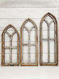 Three wall arches in successive sizes, small, medium and large. 