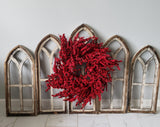 Set of 5 wood wall arches for king headboard with a red berry wreath in the middle.