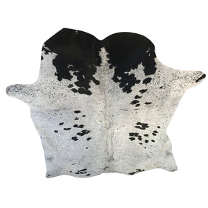 Very unique salt and pepper cowhide with darker coloring toward the head. 